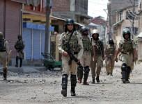 Indian security forces during curfew in Srinagar