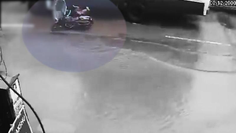 Mumbai woman on bike crushed under bus after hitting pothole