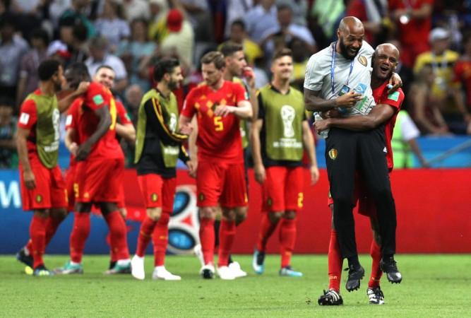 Vincent Kompany lifted Theirry Henry after the Red Devils dumped out Brazil in the quarter-final. Thierry Henry Belgium