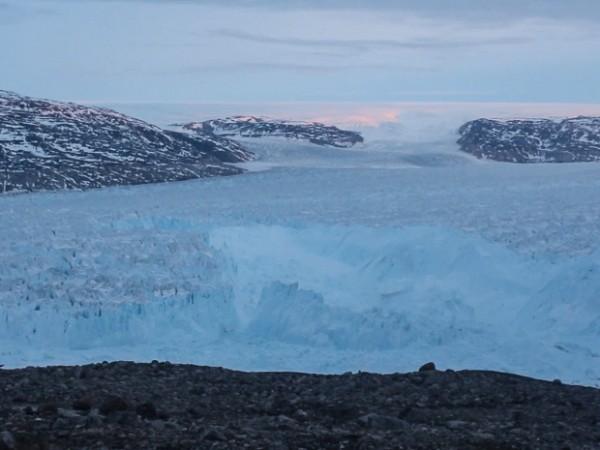 A team of scientists has captured on video a four-mile iceberg breaking away from a glacier in eastern Greenland, an event that points to one of the forces behind global sea-level rise Greenland glacier