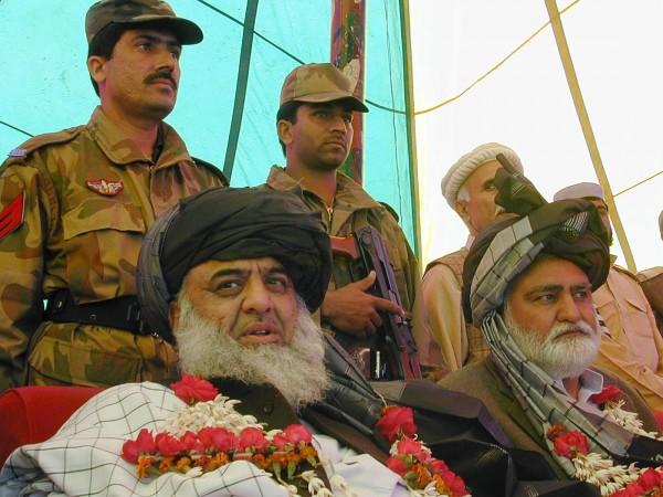 Jamiat Ulma-e-Islam leader Maulana Fazal-ur-Rehman (L) and former chief minister of NWFP province Akram Durrani attend a gathering in Rehman's constituency in northern Pakistani town of Bannu Maulana Fazal-ur-Rehman (L) and Akram Durrani