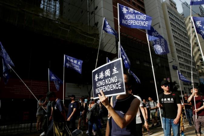 Pro-Hong Kong independence supporters take part in a march