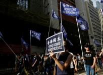 Pro-Hong Kong independence supporters take part in a march