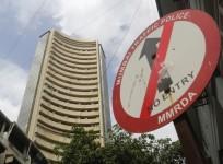 A road sign is seen next to Bombay Stock Exchange (BSE) building in Mumbai