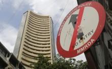 A road sign is seen next to Bombay Stock Exchange (BSE) building in Mumbai
