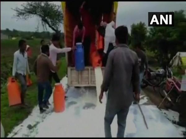 Amid ongoing protests demanding hike in the price of milk, workers of Swabhimani Shetkari Sangathna on Wednesday spilled milk on the roads of Jalna as a mark of protest. workers of Swabhimani Shetkari Sangathna