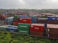 Cargo containers are seen stacked outside the container terminal of Jawaharlal Nehru Port Trust