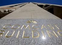 The NBC logo and Comcast are displayed on 30 Rockefeller Plaza