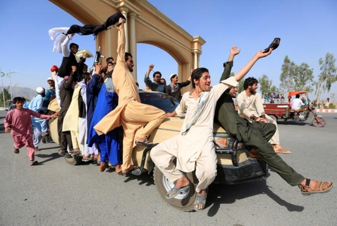 People celebrate ceasefire in Rodat district of Nangarhar province, Afghanistan June 16, 2018. People celebrate ceasefire in Rodat district of Nangarhar province