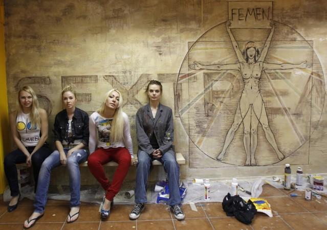 Activists of Ukrainian women's rights group Femen (L-R) Yana Zhdanova, Alexandra and Inna Shevchenko, and Oksana Shachko sit in their office in Kiev May 18, 2012. Activists of Ukrainian women's rights group Femen