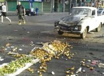 Damages after a suicide bomb attack are seen in Sweida, Syria
