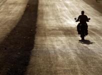 Africa road trip/ A southern Sudanese man rides a motorcycle during sunset in Juba, January 5, 2011. The referendum, guaranteed by a 2005 peace deal between north and south which ended Africa's longest civil war, is forecast to result in secession, but ex