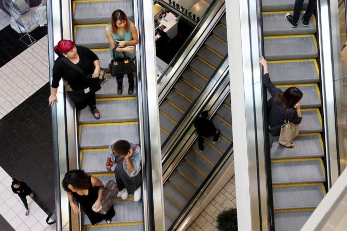 FILE PHOTO: Shoppers ride escalators at the Beverly Center mall in Los Angeles, California, U.S., November 8, 2013. Shoppers ride escalators at the Beverly Center mall in Los Angeles