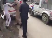 Screenshot of the UP police manhandling two female protestors