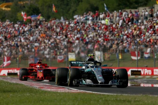 Valtteri Bottas of Mercedes leads Sebastian Vettel of Scuderia Ferrari in Hungary Formula 1