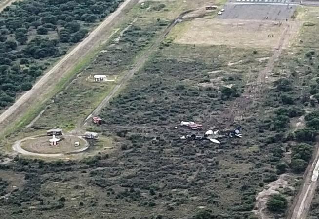 Picture showing the wreckage of a plane that crashed with 97 passengers and four crew on board on take off at the airport of Durango, in northern Mexico, on July 31, 2018. - Dozens of people were injured as an airliner crashed on takeoff during a heavy hailstorm in northern Mexico, engulfing the plane in flames, Aeromexico airline and passengers said Tuesday. Aeromexico plane crash site in Durango