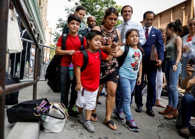Immigrant mother reunited with kids