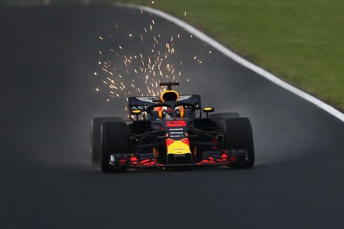 Sparks fly behind Daniel Ricciardo's Red Bull Racing RB14 TAG Heuer on track during Grand Prix of Hungary at Hungaroring on July 28, 2018 Daniel Ricciardo