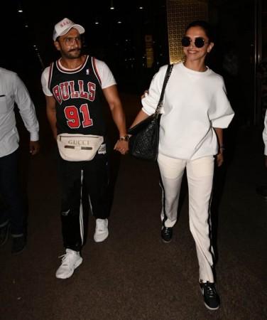 Ranveer Singh, Deepika Padukone spotted at Mumbai airport walking hand-in-hand after returning from secret US trip. Ranveer Singh, Deepika Padukone