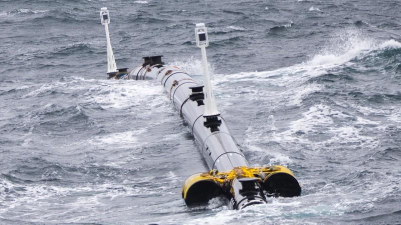 A section of the 2000-foot long array being tested in storm conditions The Ocean Cleanup
