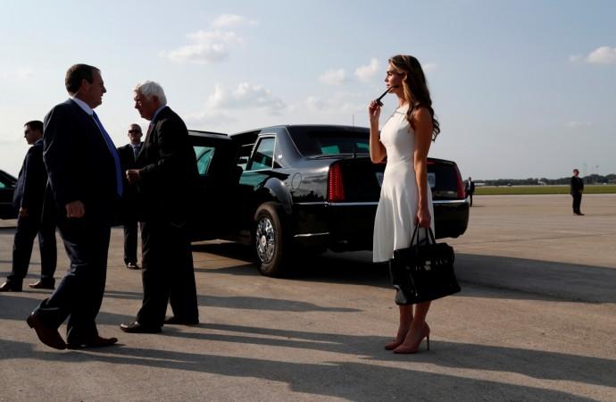 ormer White House Communications Director Hope Hicks stands behind U.S. President Donald Trump Hope Hicks