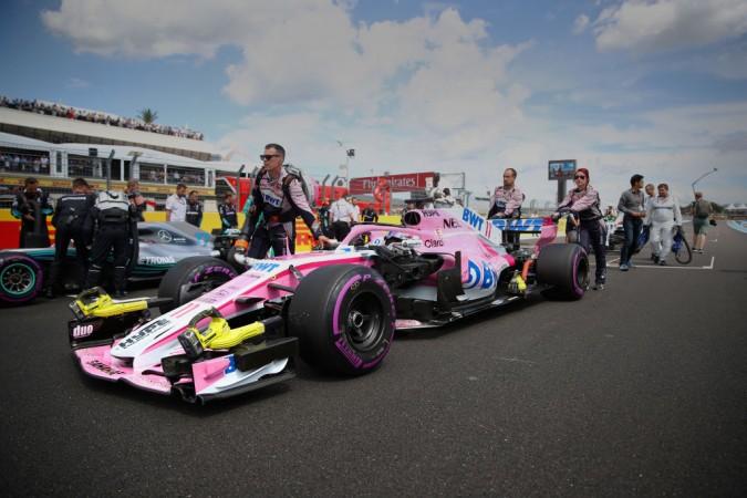 Force India team prepare on the grid before the Formula One Grand Prix of France at Circuit Paul Ricard on June 24, 2018 Force India team