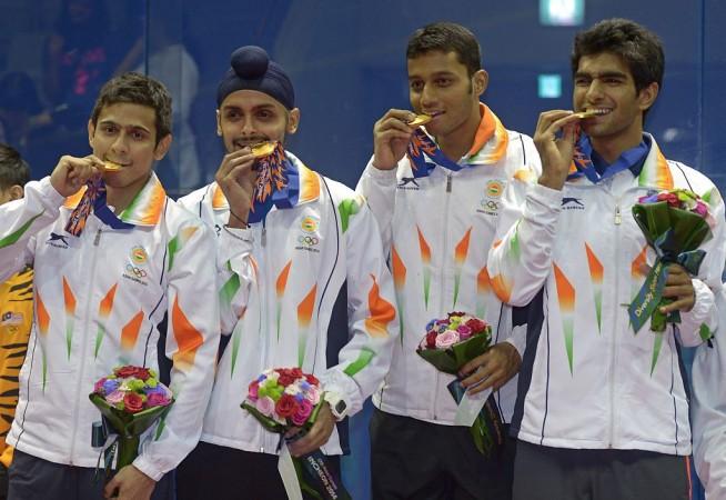 Mahesh Mangaonkar (second from right) along with the gold medal-winning Indian squash team at Asian Games 2014. India squash at Asian Games 2018