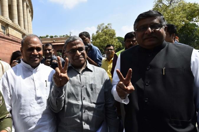 The newly elected Rajya Sabha Deputy Chairperson Harivansh Narayan Singh and Union Minister and BJP MP Ravi Shankar Prasad show victory sign at Parliament, in New Delhi on Aug 9, 2018. Janata Dal United (JD-U) Member Harivansh Narayan Singh who was fielded by the BJP-led ruling National Democratic Alliance (NDA), defeated opposition candidate B.K. Hariprasad of the Congress by 20 votes. Harivansh Narayan Singh