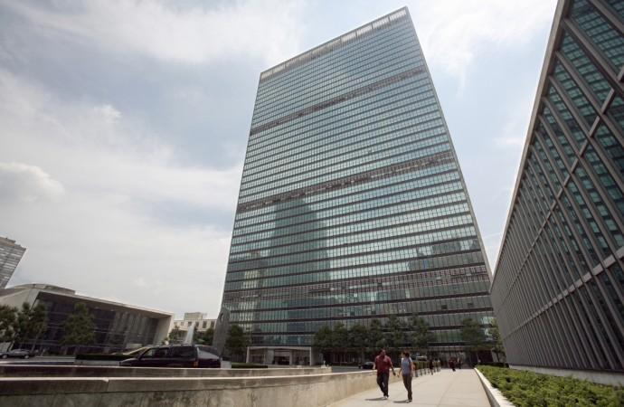 People walk in front of the United Nations Headquarters in New York United Nations NYC headquarters