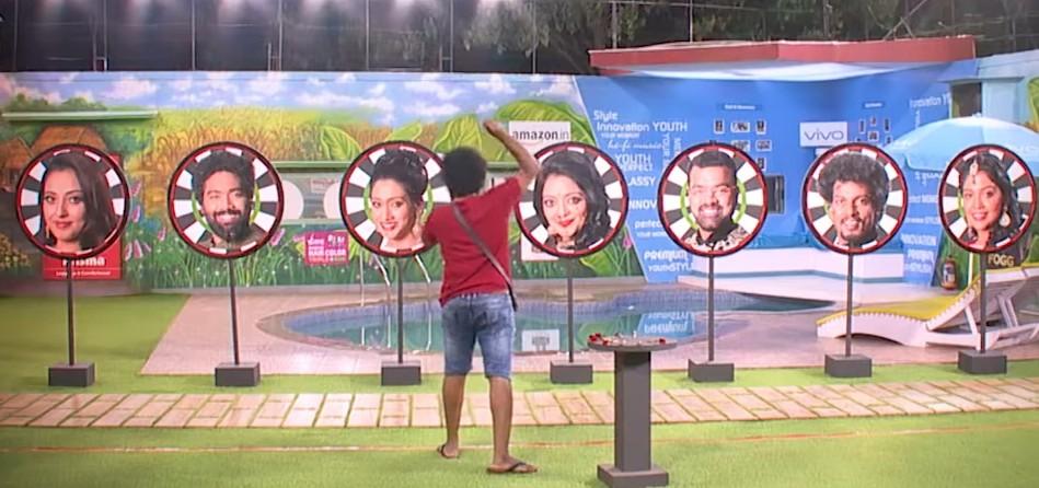 The contestants' pictures were hung on dartboards and each contestant had two darts to choose who they want to nominate in Bigg Boss Tamil 2 this week. Bigg Boss Tamil 2 Nomination