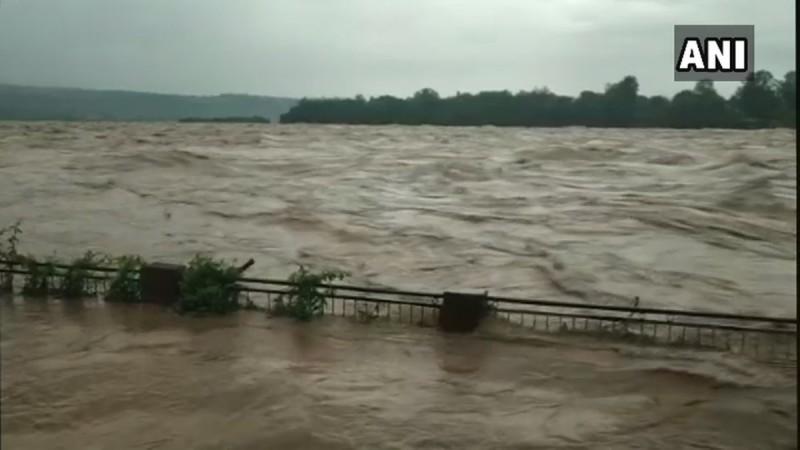 Water from the overflowing Beas river reaches bridge and roads in Nadaun following heavy rainfall in Hamirpur district. Overflowing Baes river in Hampirpur, HP