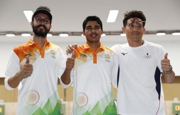16-year-old Saurabh Chaudhary (C) clinched gold on his Asian Games debut. Saurabh Chaudhary