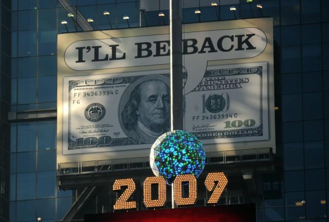 A billboard featuring a 100 US dollar bill saying 'I'll be back', is seen over Times Squares during the recession in 2009. Great Recession