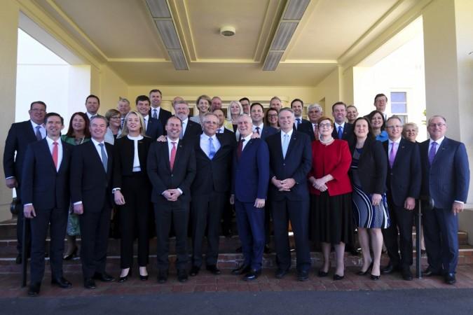 Australian Prime Minister Scott Morrison poses with the new cabinet after the swearing-in ceremony on Monday Australian cabinet