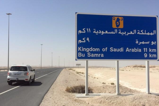 A road sign is seen near Abu Samra border crossing to Saudi Arabia in Qatar June 12, 2017. Saudi Arabia-Qatar border