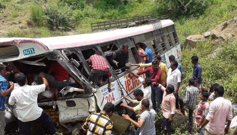 According to Mumbai Mirror, the Telangana State Road Transport Corporation bus fell off the Ghat road near Kondagattu. kondagattu bus accident