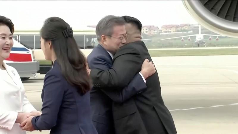 North Korean leader Kim Jong Un and his wife Ri Sol Ju greet South Korean President Moon Jae-in and First Lady Kim Jung-sook at Pyongyang Sunan International Airport kim