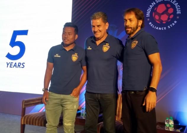 Chennaiyin FC head coach John Gregory with Jeje Lalpekhlua (L) and Inigo Calderon in Bengaluru. Chennaiyin FC