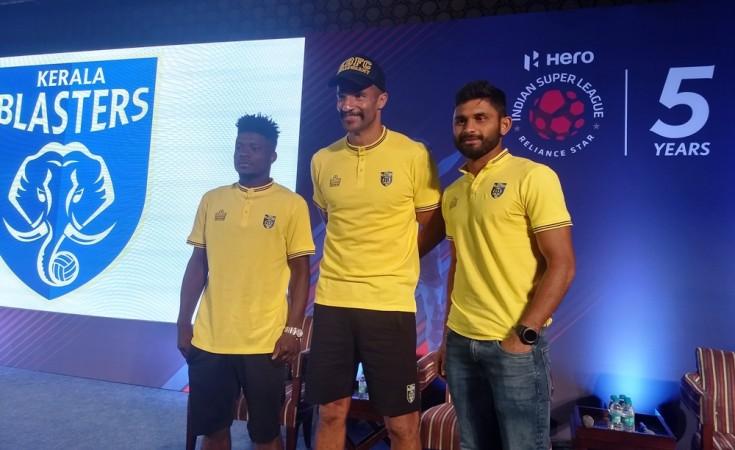 Kerala Blasters head coach David James (centre) with players Courage Pekuson (left) and Anas Edathodika (right) Kerala Blasters FC