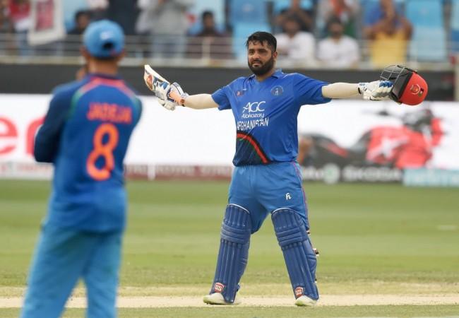 Mohammad Shahzad brought up his first ton against India on Tuesday. Mohammad Shahzad