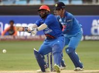 Mohammad Shahzad and MS Dhoni