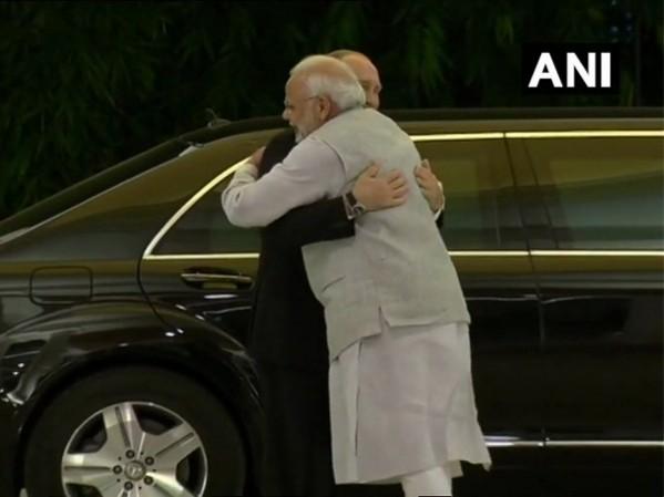 Modi greets Putin modi-putin