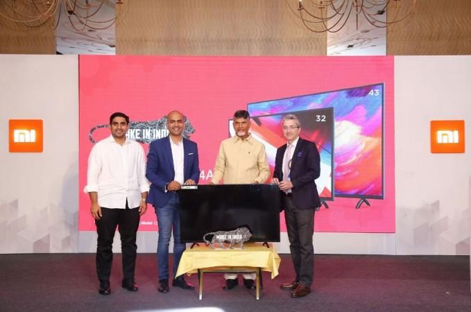 From Left to Right: Nara Lokesh, (Cabinet Minister, IT), Manu Kumar Jain(Vice President, Xiaomi and Managing Director, Xiaomi India), Chandra Babu Naidu (Chief Minister of Andhra Pradesh) and Sunil Vachani(CEO, Dixon India) at the inauguration of Make in India announceme Xiaomi Mi LED TV, manufacturing, Make in India,