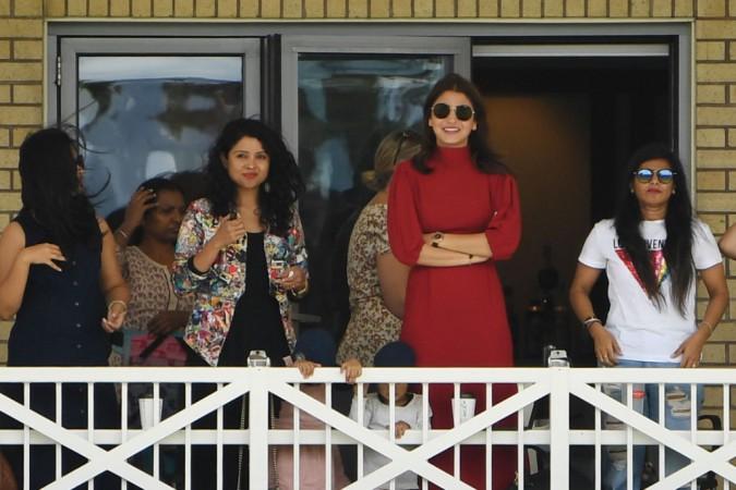 Anushka Sharma (second from right) and Prithi Ashwin (third from left) cheer for the Indian cricket team in England. Anushka Sharma