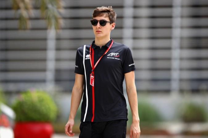 Mercedes GP reserve driver George Russell of Great Britain walks in the Paddock during previews ahead of the Bahrain Formula One Grand Prix at Bahrain International Circuit on April 5, 2018. George Russell, Formula 1