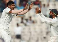 Umesh Yadav and Virat Kohli