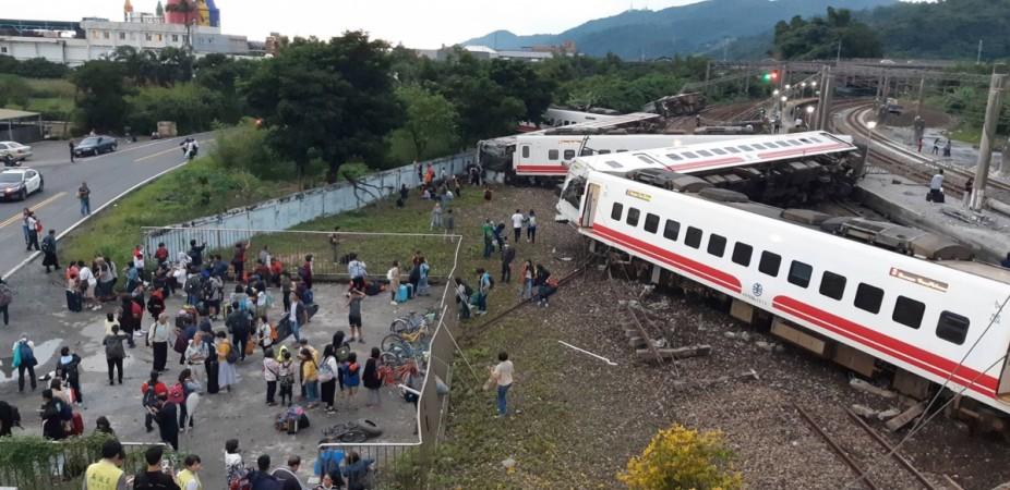 At least 18 people have died after a train derailed and flipped over in Taiwan, authorities said. Taiwan train accident