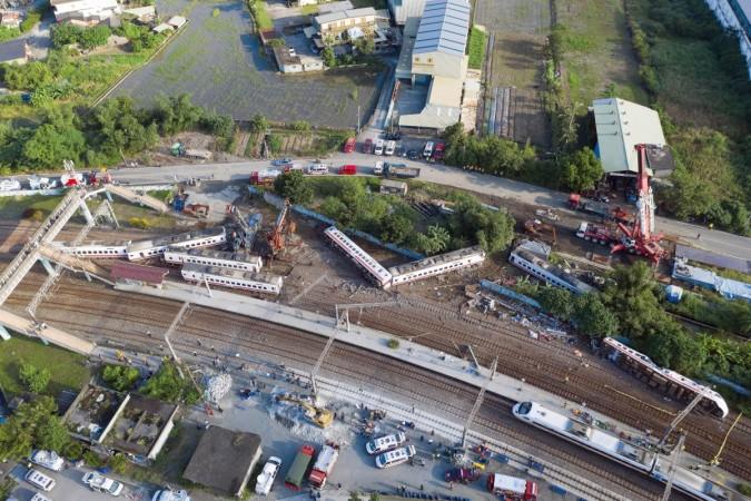 A general view shows carriages of the Puyuma Express train in Taiwan's northeastern Yilan county on October 22, 2018, a day after the train derailed at high speed near Xinma station Taiwan train accident