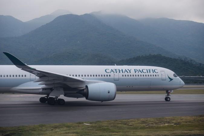 A Cathay Pacific airlines passenger plane prepares to take off from the international airport in Hong Kong Cathay Pacific