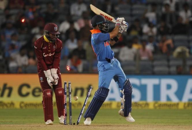 Virat Kohli fell to part-timer Marlon Samuels after reaching his third straight ton in Pune. Virat Kohli